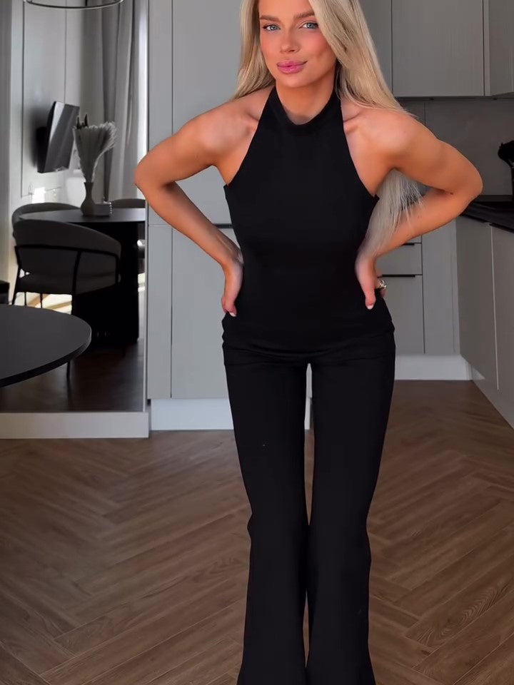 Jumpsuit dam – svart ärmlös byxdress med halterneck