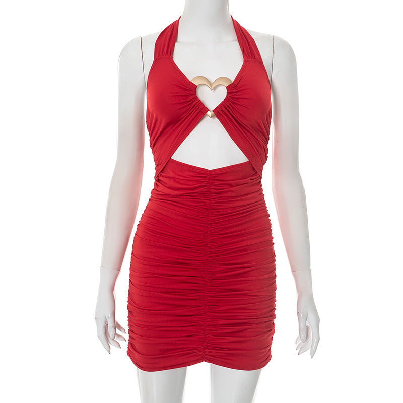 Damklänning – åtsittande sheath-modell med trendiga utskärningar