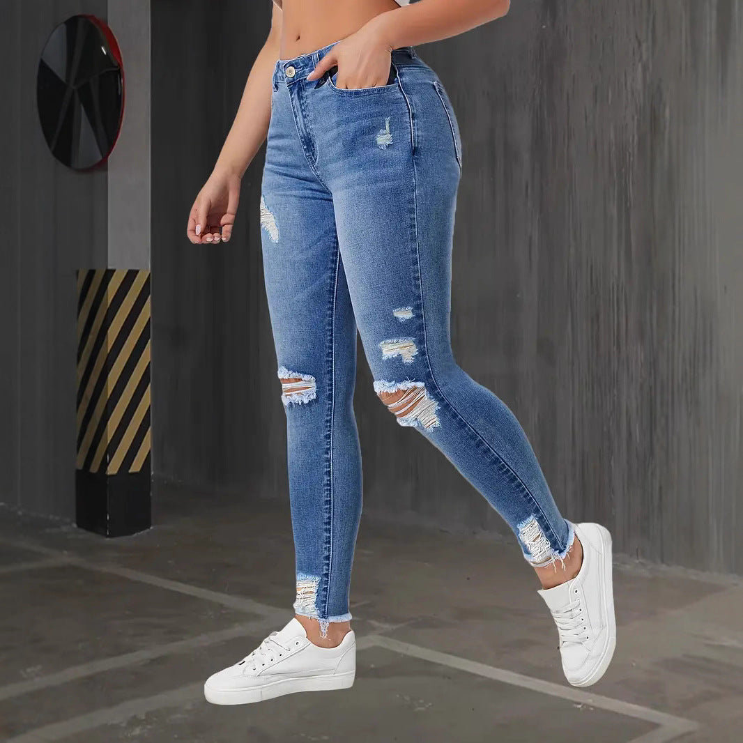 Jeans Dam – Slim Fit Stretchjeans med Ripped Detaljer & Smal Fot
