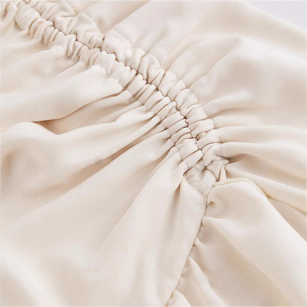 Kjol för Dam – Asymmetrisk Högmidjad med Knytning & Volangdetaljer