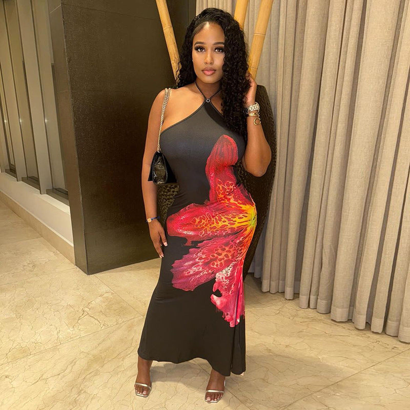 Damklänning – halterneck med blommigt tryck i trendig design